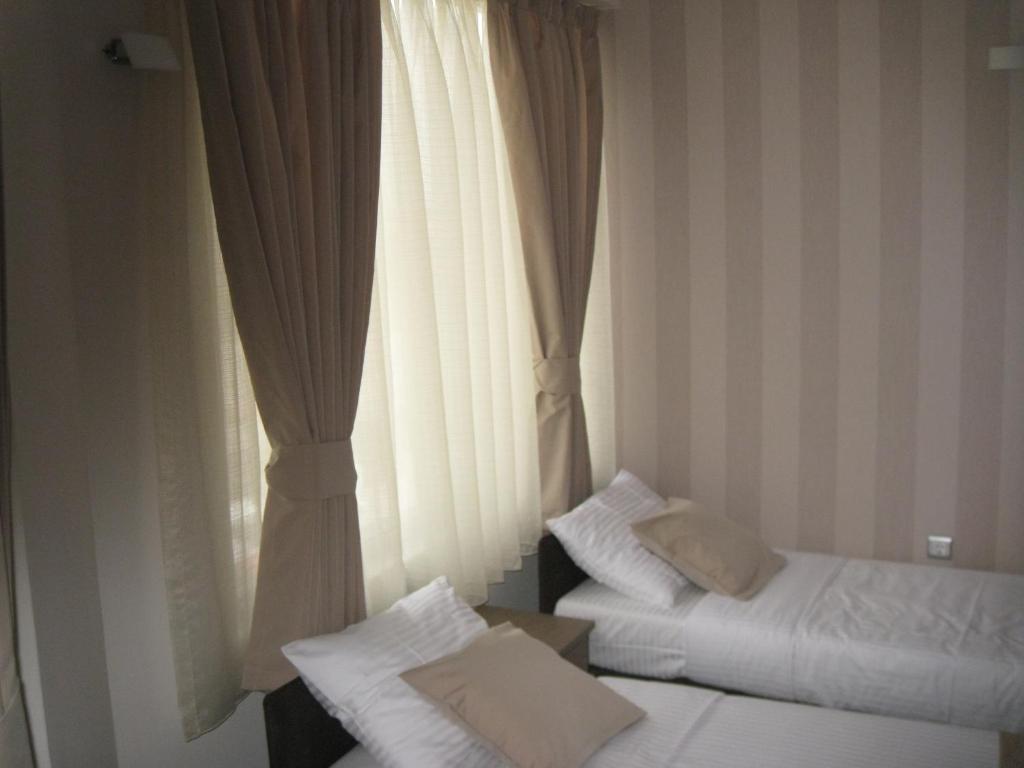 Domus Aparthotel Скопье Номер фото